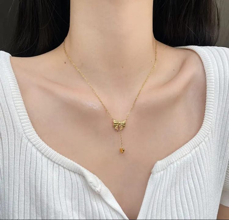 Elegant Gold Bow and Heart Pendant Necklace